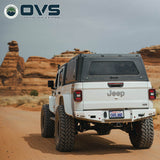 OVS Expedition PRO (2020–2027 Gladiator) — Lifestyle shot: cap in use outdoors, set up for hauling gear and camping trips