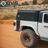 OVS Expedition PRO (2020–2027 Gladiator) — Lifestyle shot: cap in use outdoors, set up for hauling gear and camping trips