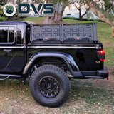 OVS Ruff Rax Bed Rack – 2018–2027 Jeep Gladiator 5 ft — Lifestyle shot: rack installed on the truck; rooftop tent, awning and recovery gear carried above the bed for multi-day trips.