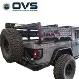 OVS Ruff Rax Bed Rack – 2018–2027 Jeep Gladiator 5 ft — Lifestyle shot: rack installed on the truck; rooftop tent, awning and recovery gear carried above the bed for multi-day trips.