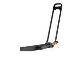 KUAT Piston SR Bike Tray — Feature shot: close-up of the OneTap tire arm handle and Kashima-coated strut at the pivot joint