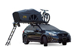 Roofnest Meadowlark — Feature shot: open tent on a Subaru Crosstrek, front view with ladder deployed