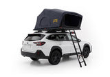 Roofnest Meadowlark 2 XL — Feature shot: open soft shell tent on a white Subaru Outback, rear view with ladder