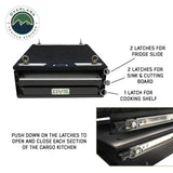 OVS Mid-Size Cargo Box Kitchen with Slide-Out Sink & Work Station — Feature shot: latch push tab