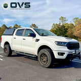 OVS Expedition PRO (2019–2023 Ranger) — Lifestyle shot: cap in use outdoors, set up for hauling gear and camping trips