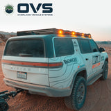 OVS Ruff Rax Roof Rack – 2022–2027 Rivian R1S — Feature shot: rear three-quarter view