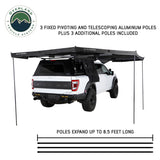 OVS XD Nomadic 270 Awning with Lights & Blackout — Feature shot: deployed on a pickup with the pivoting telescoping aluminum support poles