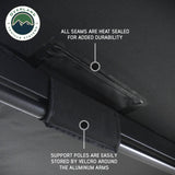 OVS XD Nomadic 270 Awning with Lights & Blackout — Feature shot: heat-sealed seams and support poles stowed along the rafters