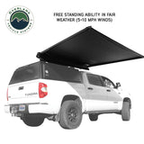 OVS XD Nomadic 90 Self-Deploying Awning — Feature shot: freestanding in wind with poles stowed