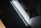 Roofnest Falcon 3 EVO XL Air — Feature shot: dimmable LED light strip glowing along the interior