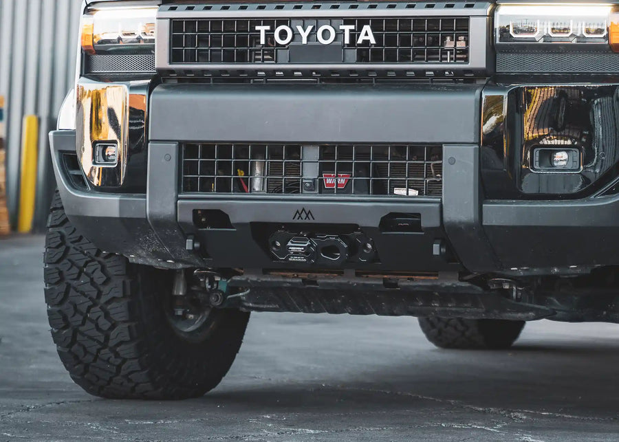 Backwoods Adventure Mods Lo-Pro Hidden Winch Bumper (2024–2027 Land Cruiser 250) — Feature shot: hidden winch bumper installed on a Land Cruiser 250
