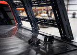 Backwoods Adventure Mods Retractable Cover Mounts (Universal) — Feature shot: Backwoods Adventure Mods bed rack mounted to a Retrax cover with the adapters