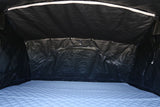 Roofnest Meadowlark — Feature shot: USB-powered LED strip lighting the interior over the foam mattress