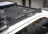 Backwoods Adventure Mods DRIFTR Roof Rack (2024–2027 Tacoma) — Feature shot: side of the rack with accessories mounted