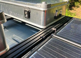 Backwoods Adventure Mods DRIFTR T-Nut Kit (Universal) — Lifestyle shot: T-nuts holding solar panel brackets on a DRIFTR roof rack