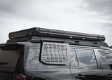 Backwoods Adventure Mods DRIFTR Roof Rack (2024–2027 Land Cruiser 250) — Lifestyle shot: rooftop tent mounted on the rack
