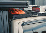 Backwoods Adventure Mods DRIFTR Roof Rack (2005–2023 Tacoma) — Feature shot: rear of the rack with recovery gear and storage boxes