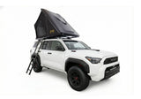 Roofnest Falcon 3 EVO XL Air — Feature shot: open tent on a white 4Runner with the telescoping ladder deployed
