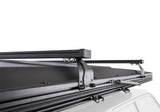 Roofnest Falcon 3 EVO XL Air — Feature shot: optional crossbar mounted across the closed shell for carrying gear