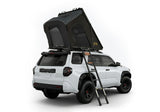 Roofnest Falcon 3 EVO XL Air — Feature shot: open clamshell on a 4Runner roof rack, rear view showing the full canvas walls