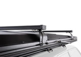 Roofnest Falcon 3 EVO Air — Feature shot: optional crossbar mounted across the closed shell for carrying gear