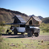 OVS LD TMON aluminum clamshell rooftop tent open on a truck in the desert