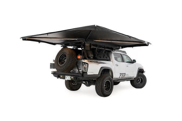 FSR 270 Awning — Feature shot: full deployed awning with integrated LED lighting illuminated, installed on a Toyota Tacoma