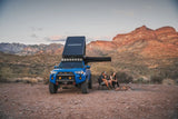 FSR Aspen Pro — Lifestyle shot: deployed alongside a side awning at a campsite