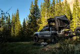 FSR Kali — Lifestyle shot: silver Tacoma with the Kali installed, forested mountain backdrop
