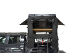 FSR Kali — Feature shot: door open showing the interior memory foam mattress and headroom