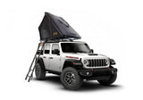 Roofnest Falcon 3 EVO Air — Feature shot: open tent on a white Jeep Wrangler, front three-quarter view
