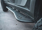 Backwoods Adventure Mods Rock Sliders (2024–2027 Land Cruiser 250) — Feature shot: removable aluminum top plate with textured powder coat