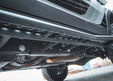 Backwoods Adventure Mods Rock Sliders (2024–2027 Land Cruiser 250) — Feature shot: bolt-on frame mount