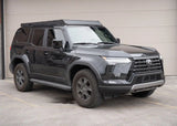 Backwoods Adventure Mods DRIFTR Roof Rack (2024–2027 GX550) — Lifestyle shot: black 2024 GX550 with the rack installed