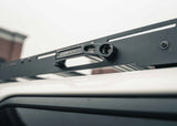 Backwoods Adventure Mods DRIFTR Roof Rack (2024–2027 GX550) — Feature shot: close-up of the rack with an aluminum grab handle