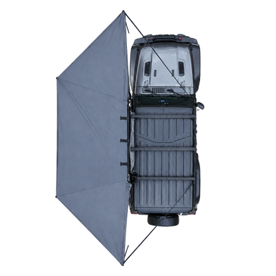 NaturNest 180° Car Awning — Feature shot: full canopy deployed beside a vehicle, 180-degree freestanding coverage