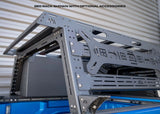 Backwoods Adventure Mods Overland Bed Rack (2020–2027 Gladiator) — Lifestyle shot: Gladiator rack loaded with accessories