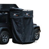 NaturNest Shower Room — Feature shot: full unit deployed and mounted to a vehicle's side door