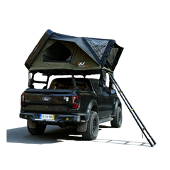 Black Ford truck with a rooftop tent on a white background