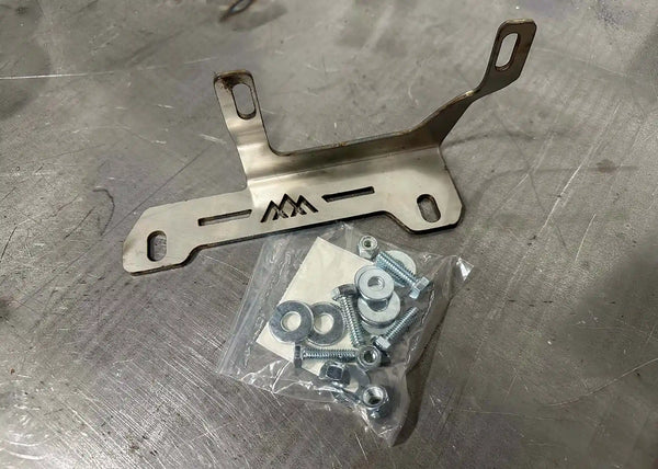 Backwoods Adventure Mods TSS Relocation Bracket (2010–2024 4Runner) — Feature shot: raw stainless bracket showing the sensor mounting holes