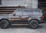 Backwoods Adventure Mods DRIFTR Roof Rack (2024–2027 Land Cruiser 250) — Feature shot: black Land Cruiser 250 with the rack