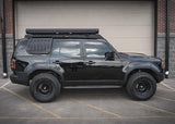 Backwoods Adventure Mods DRIFTR Roof Rack (2024–2027 Land Cruiser 250) — Feature shot: rack on the Land Cruiser 250, three-quarter view
