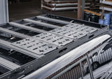 Backwoods Adventure Mods DRIFTR Roof Rack (2024–2027 Land Cruiser 250) — Feature shot: modular deck plates mounted on the crossbars