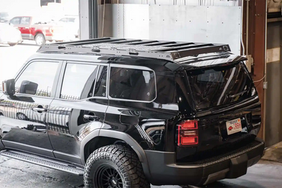 Backwoods Adventure Mods DRIFTR Roof Rack (2024–2027 Land Cruiser 250) — Feature shot: side of the rack on a Land Cruiser 250