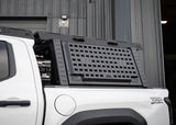 Backwoods Adventure Mods Bed Rack Storage Box (2005–2027 Tacoma) — Feature shot: exterior MOLLE panel for accessories
