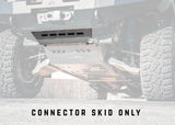 Backwoods Adventure Mods Connector Skid Plate (2005–2023 Tacoma) — Feature shot: underside view of the installed connector skid