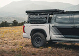 Backwoods Adventure Mods Overland Bed Rack Full Height (2007–2027 Tundra) — Feature shot: rooftop tent, traction boards and other add-ons on the rack