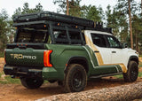 Backwoods Adventure Mods Overland Bed Rack Full Height (2007–2027 Tundra) — Feature shot: rack carrying a rooftop tent and off-road gear